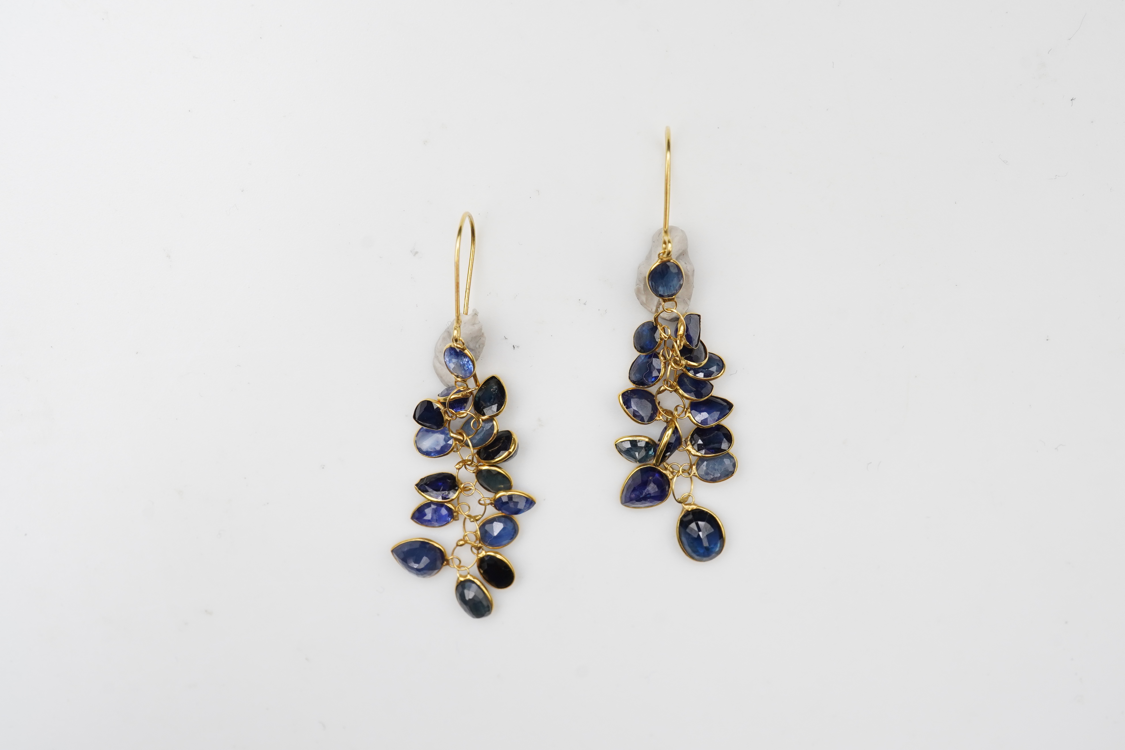 A pair of sapphire pendent earrings